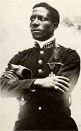 http://upload.wikimedia.org/wikipedia/commons/8/8a/Eugene_Jacques_Bullard%2C_first_African_American_combat_pilot_in_uniform%2C_First_World_War.jpg